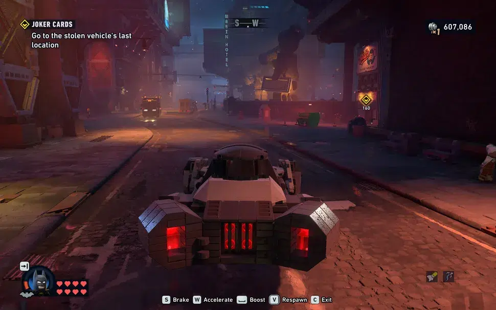 Lego Batman: Legacy of the Dark Knight incelemesi: Lego Batman bir Gotham çatısında yağmur altında nöbet tutuyor